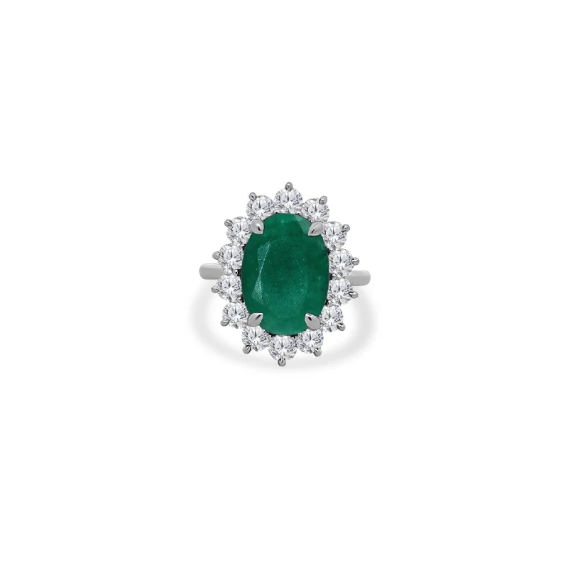 Women’s diamond solitaires engagement rings-Oval Cut Emerald with Jumbo Round Diamond Halo