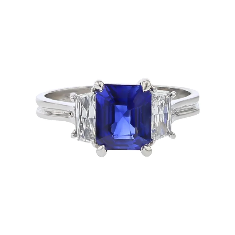 Women’s antique engagement rings-Platinum Emerald-cut Sapphire and Diamond 3-Stone Ring