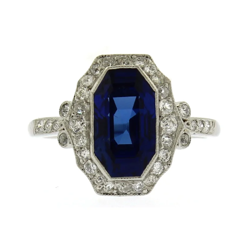 Women’s blue sapphire engagement rings-Platinum Sapphire and Diamond Halo Ring