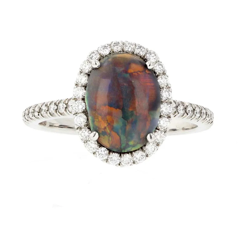 Women’s large stone engagement rings-Platinum Cabochon Black Opal and Diamond Halo Ring