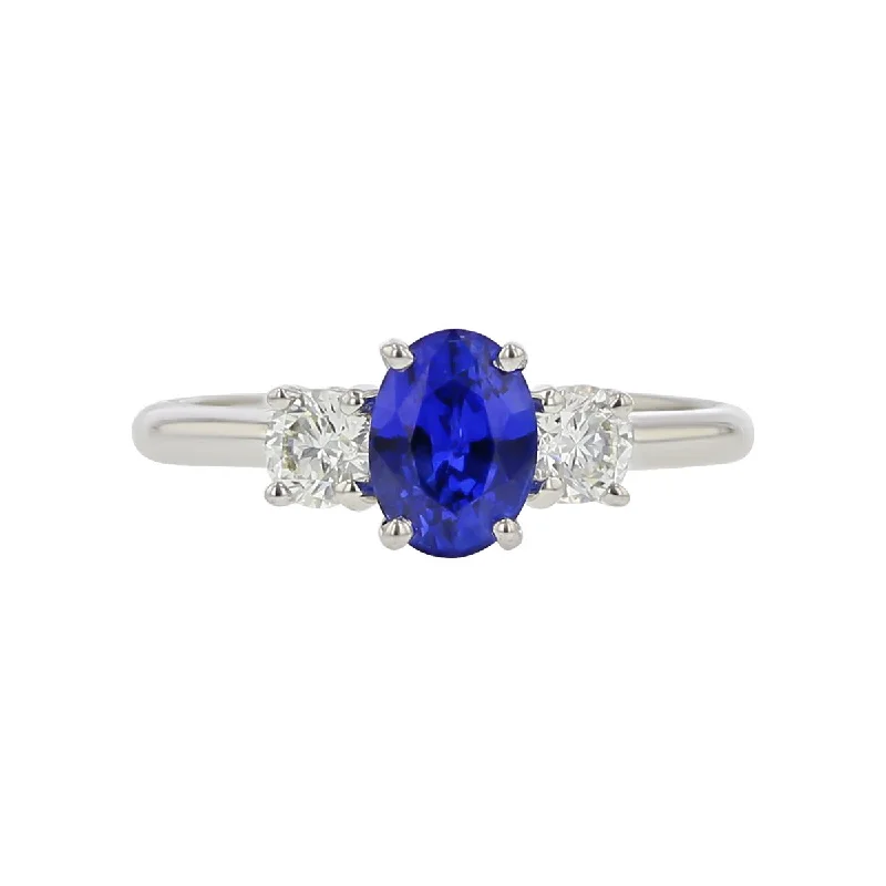 Women’s multi-stone engagement rings-Blue Sapphire and Diamond 3-Stone Ring