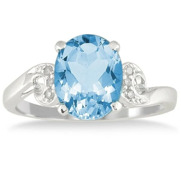 Women’s wedding ring sets-3 1/4 Carat Oval Blue Topaz and Diamond Ring in 10K White Gold