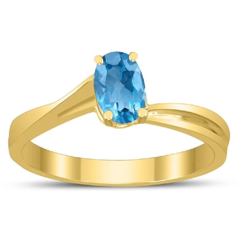 Women’s stackable rings-Solitaire Oval 6X4MM Blue Topaz Gemstone Twist Ring in 10K Yellow Gold