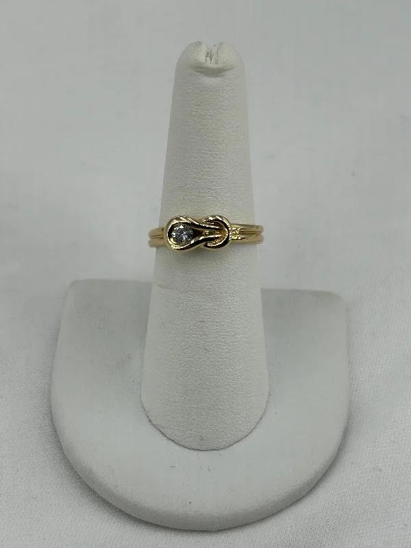 Women’s personalized rings-10kt yg knot ring with .10 ctw natural diamond size 7 3g