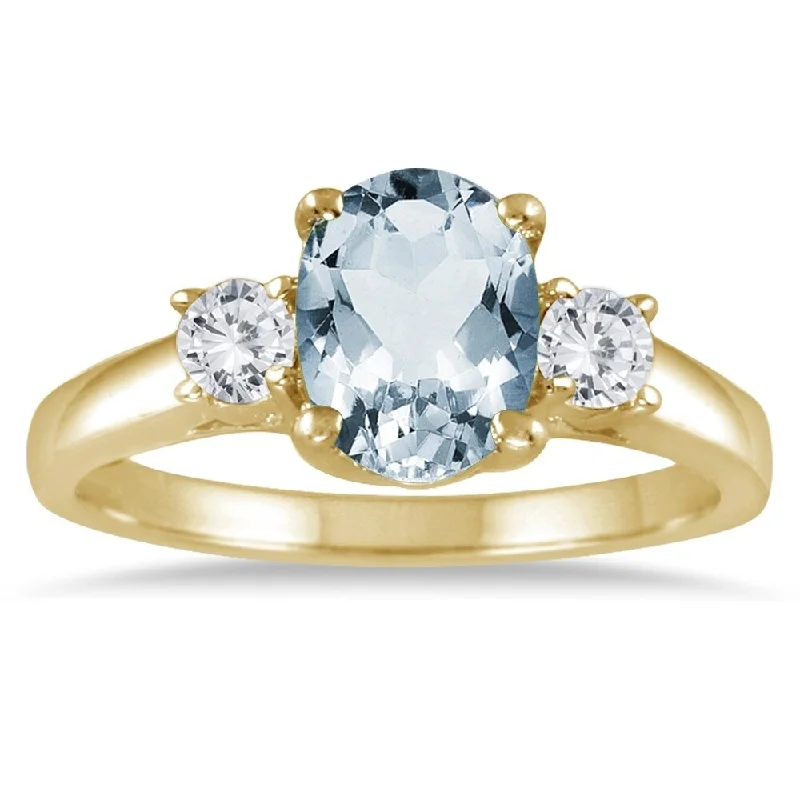 Women’s two-tone rings-Aquamarine and Diamond Three Stone Ring 14K Yellow Gold