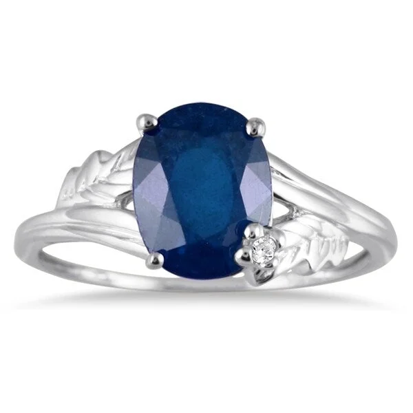 Women’s engagement rings-2 1/4 Carat Oval Sapphire and Diamond Leaf Ring in 10K White Gold