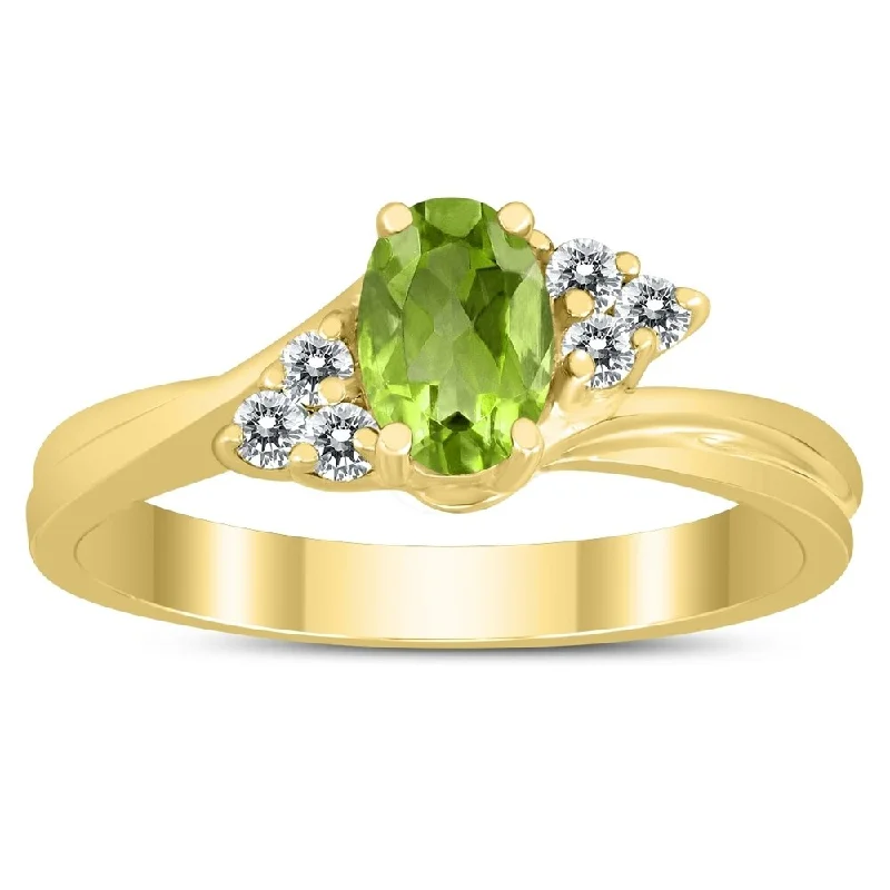 Women’s custom rings-6X4MM Peridot and Diamond Twist Ring in 10K Yellow Gold