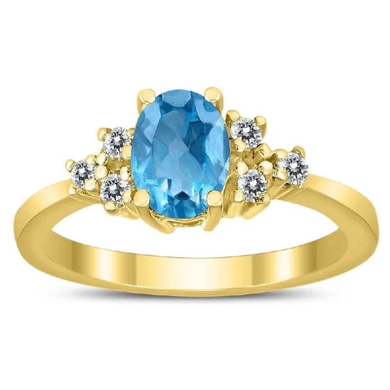 Women’s silver engagement rings-7X5MM Blue Topaz and Diamond Regal Ring in 10K Yellow Gold