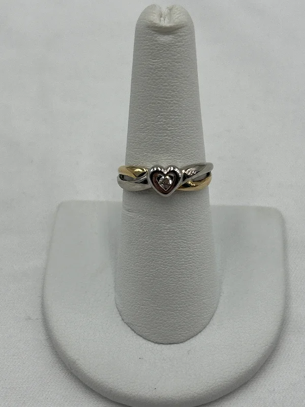 Women’s infinity rings-10kt two tone bypass ring with heart center .06ctw diamond center size 7 2.6g