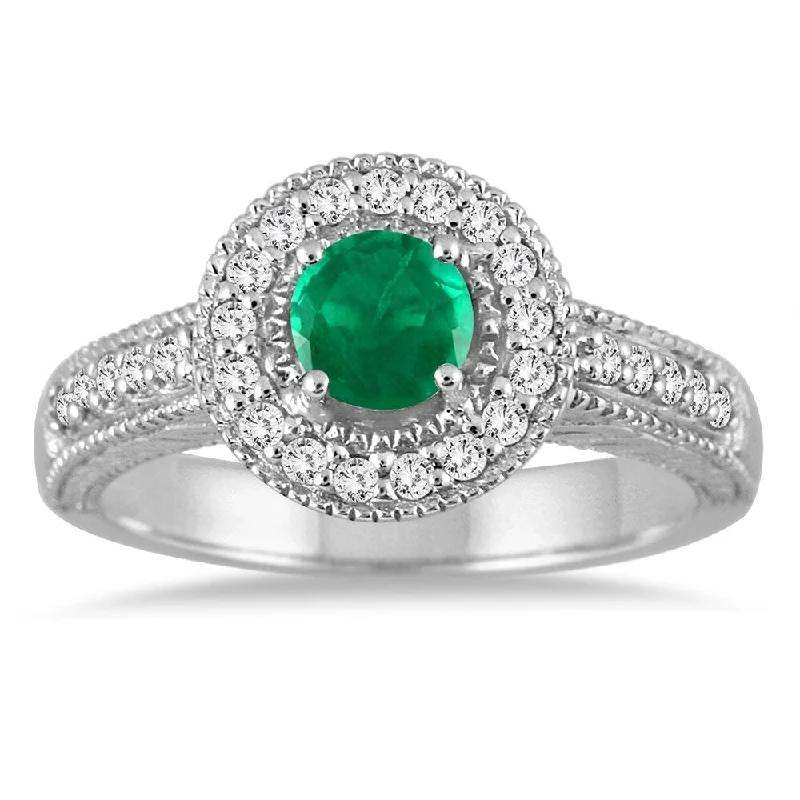 Women’s statement engagement rings-Emerald and Diamond Halo Ring in 10K White Gold