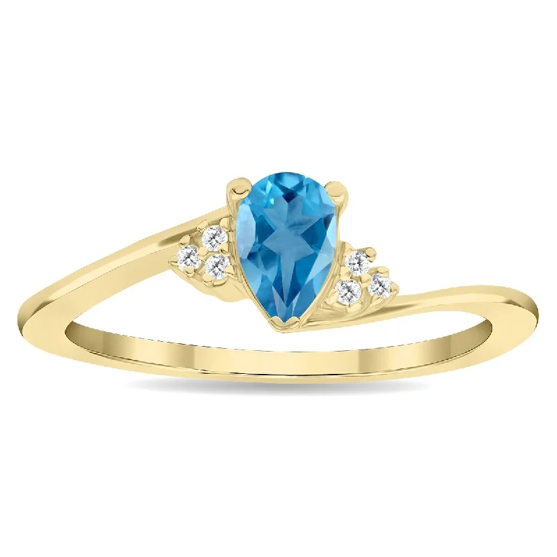 Women’s cocktail gemstone rings-Women's Pear Shaped Blue Topaz and Diamond Tierra Ring in 10K Yellow Gold